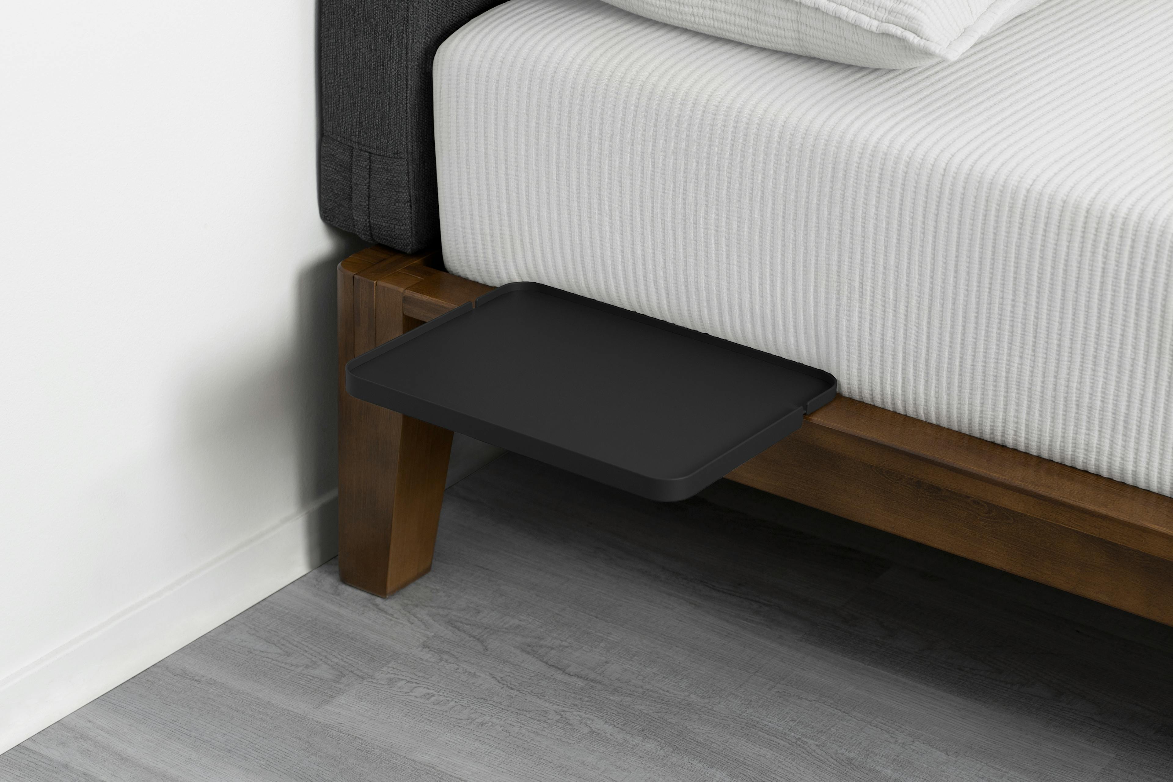 The Tray in Matte Black on a Bed