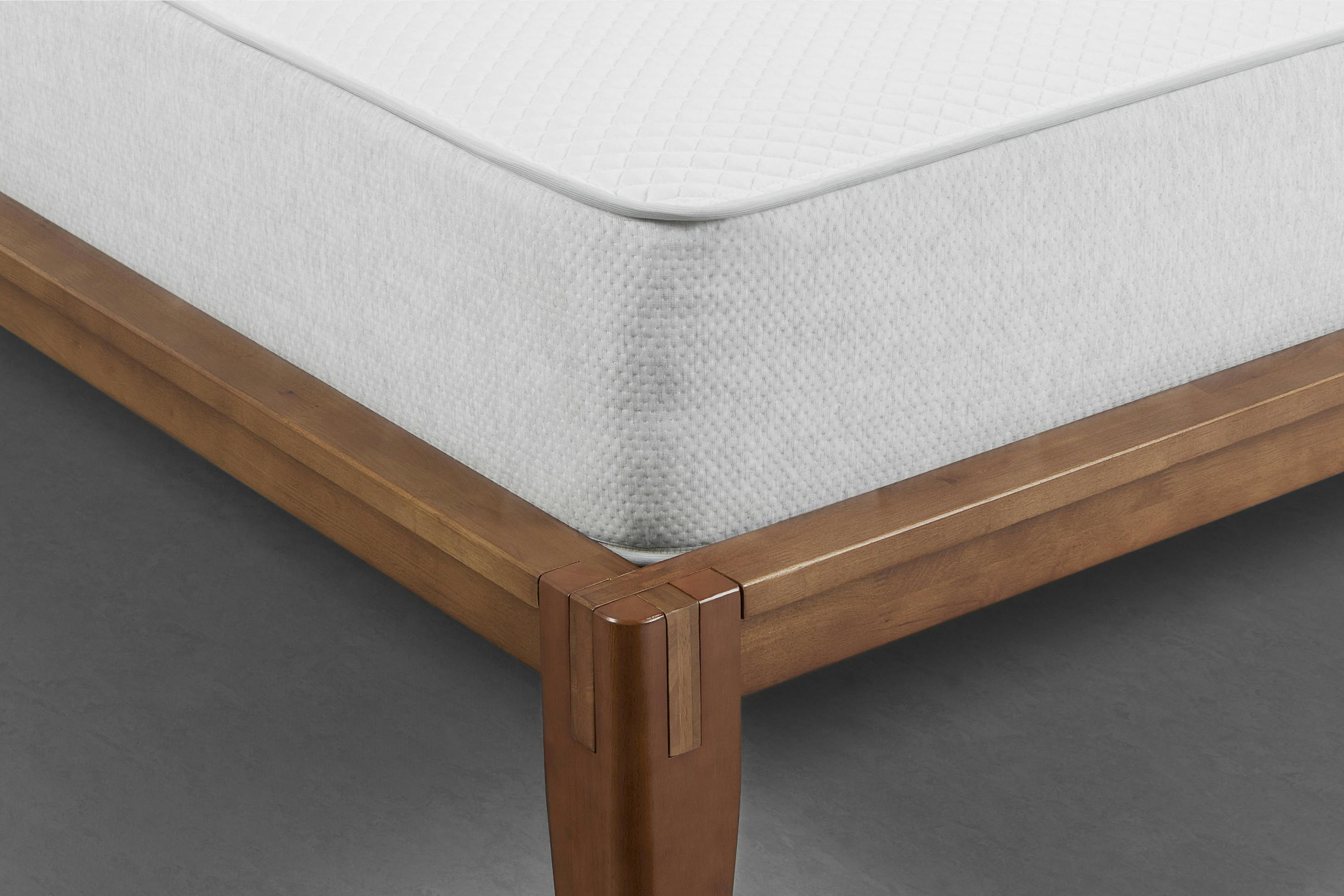The Mattress Displayed on a Bed Frame