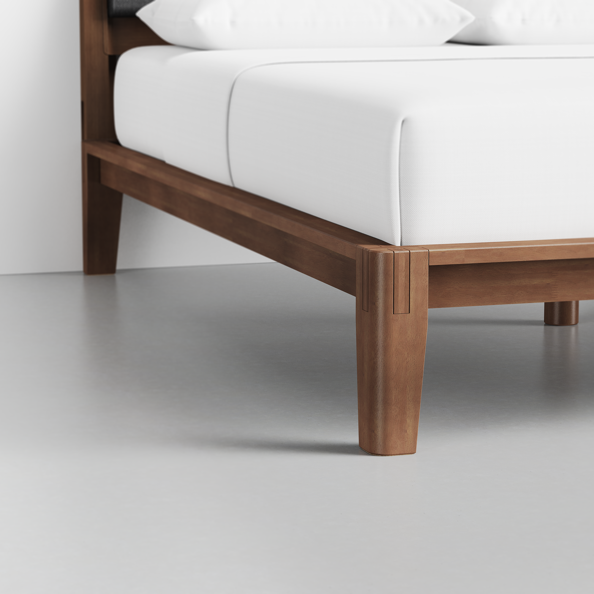 The Bed (Walnut / HB Cushion Dark Charcoal) - Render - Foot Detail
