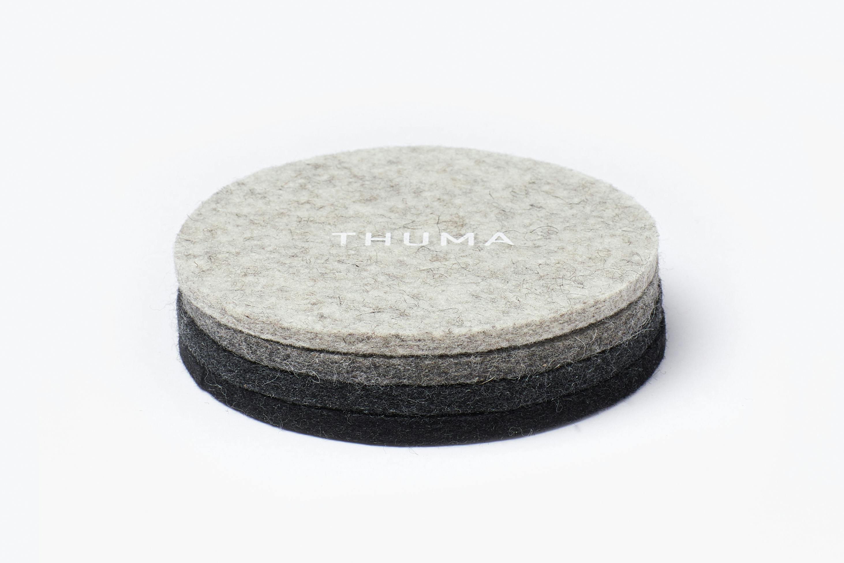 The Felt Coaster Stacked on Table